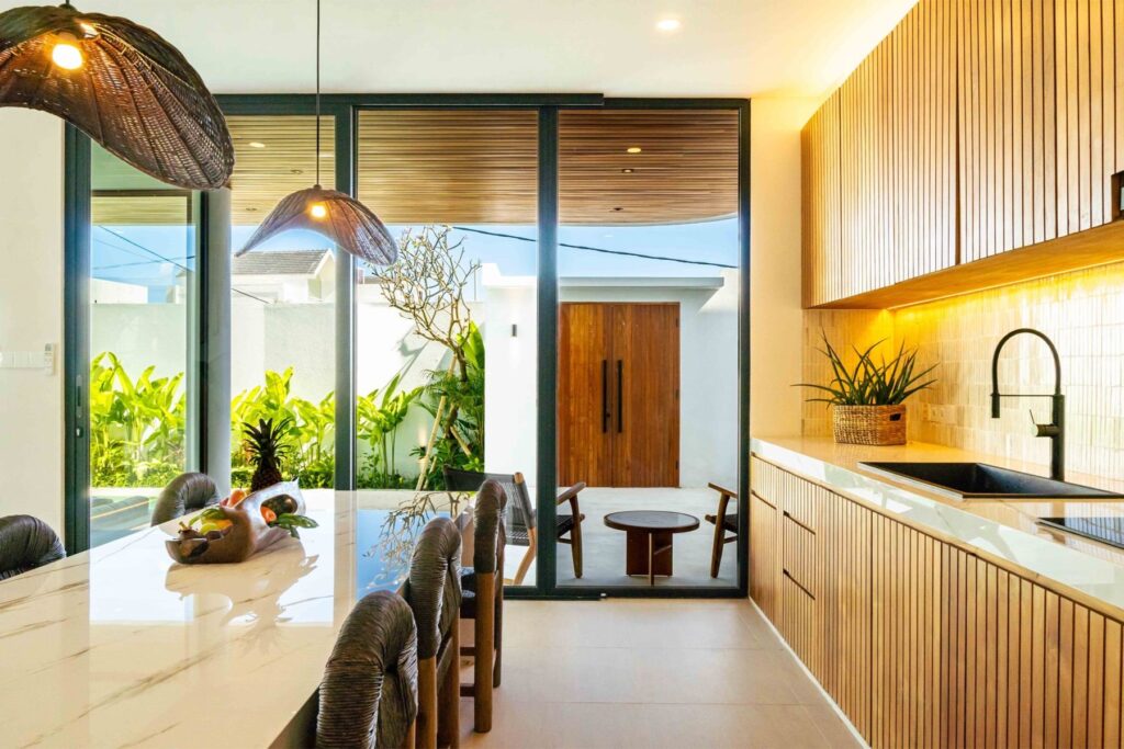 Kitchen and dining area in the evening, Villa Uno Bali
