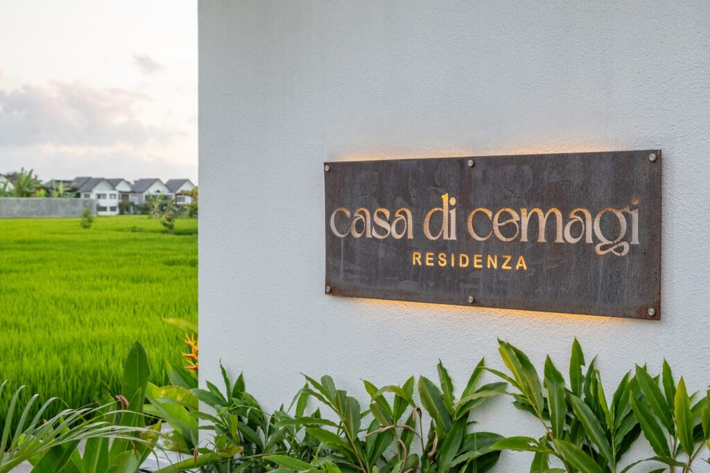Casa Di Cemagi Residenza signage beside the rice fields