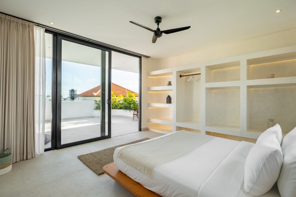 Bedroom with terrace access at Villa Tre