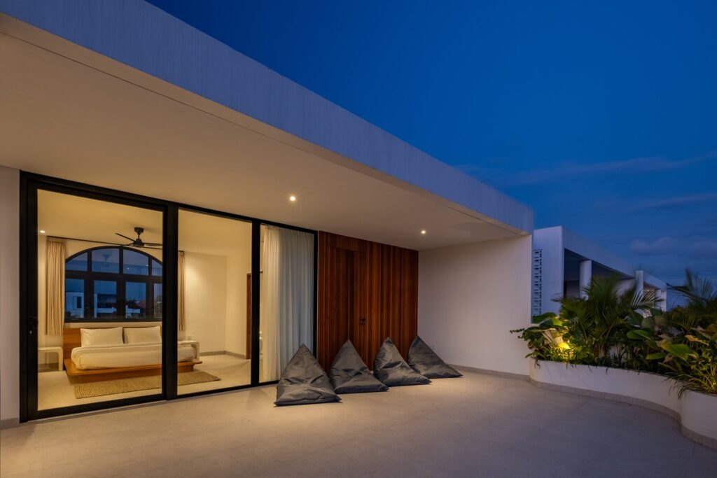 Villa Tre bedroom and terrace at dusk