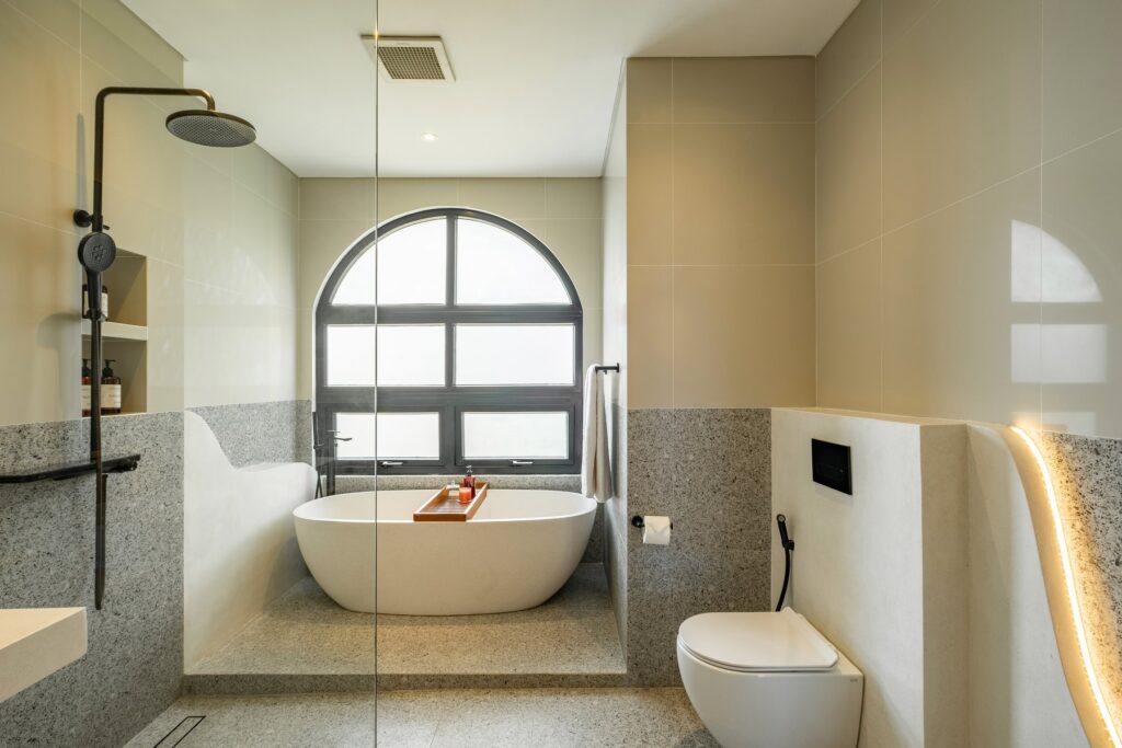 Ensuite bathroom with rain shower at Villa Tre