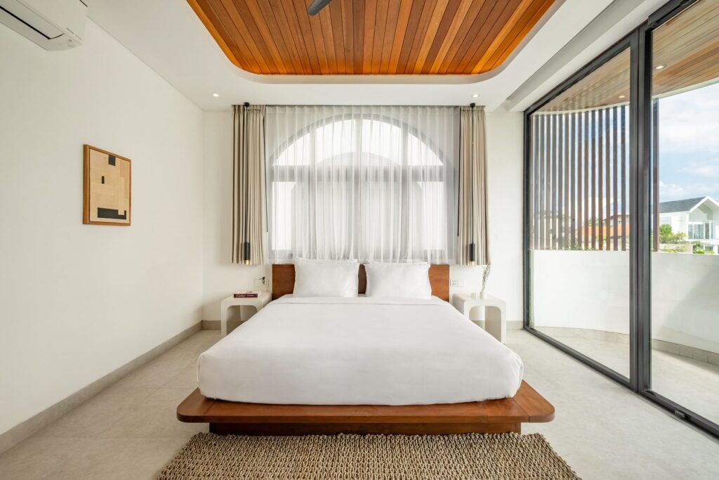 Bedroom opening to the rooftop terrace at Villa Quattro